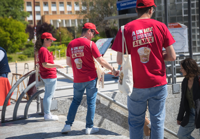 Promoters distributing flyers